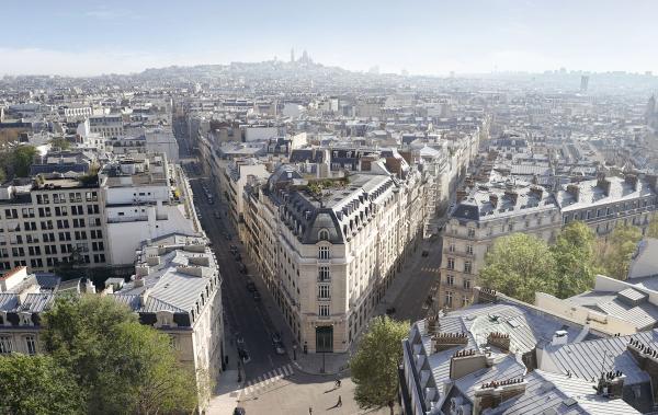 Ardian Interview with Sanofi, view on a Parisian building at a crossroads